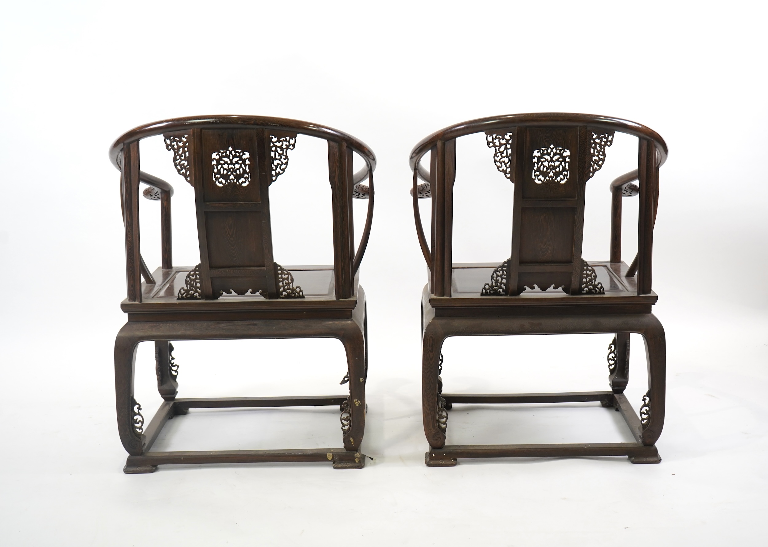A pair of Chinese jichimu horseshoe shaped armchairs and a matching table, 19th/20th century